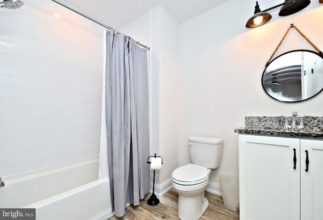 130 Schultz Rd, Sellersville, PA 18960 - full bathroom with wood finished floors, toilet, vanity, shower / bath combination with curtain, and baseboards