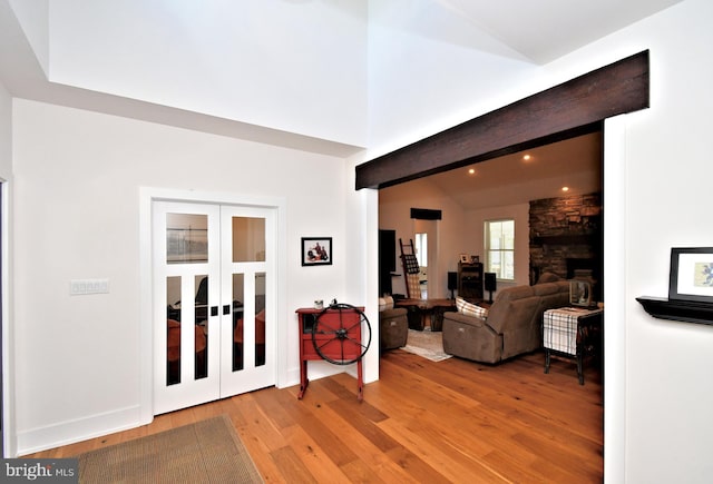 130 Schultz Rd, Sellersville, PA 18960 - foyer featuring wood finished floors, lofted ceiling, recessed lighting, and a stone fireplace