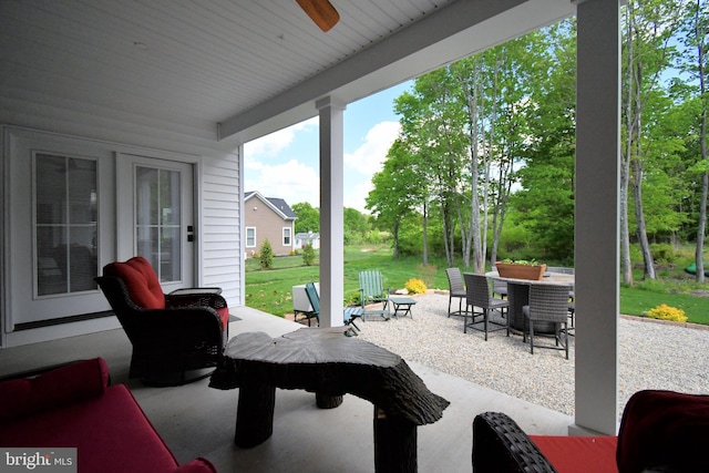 130 Schultz Rd, Sellersville, PA 18960 - view of patio / terrace with outdoor dining space, ceiling fan, and view of scattered trees