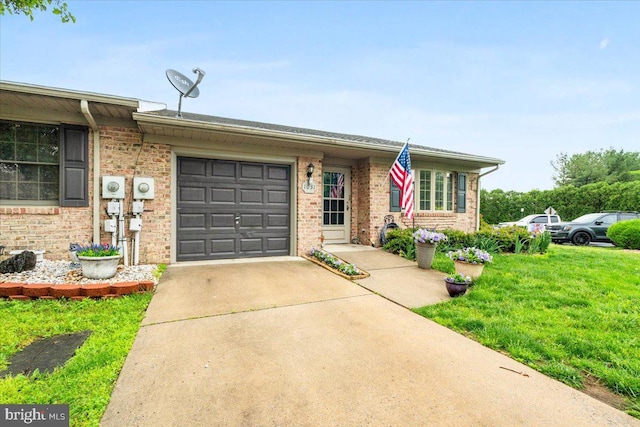view of front of house featuring brick siding, a garage, concrete driveway, and a front yard