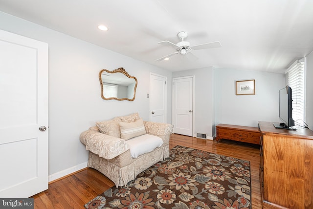 sitting room featuring wood finished floors, ceiling fan, recessed lighting, baseboards, and lofted ceiling
