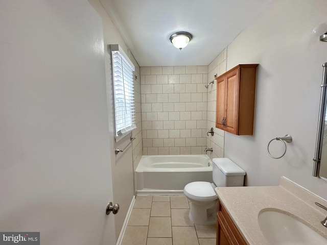 bathroom with tile patterned floors, baseboards, toilet, shower / bath combination, and vanity