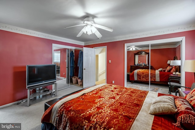 carpeted bedroom featuring ceiling fan