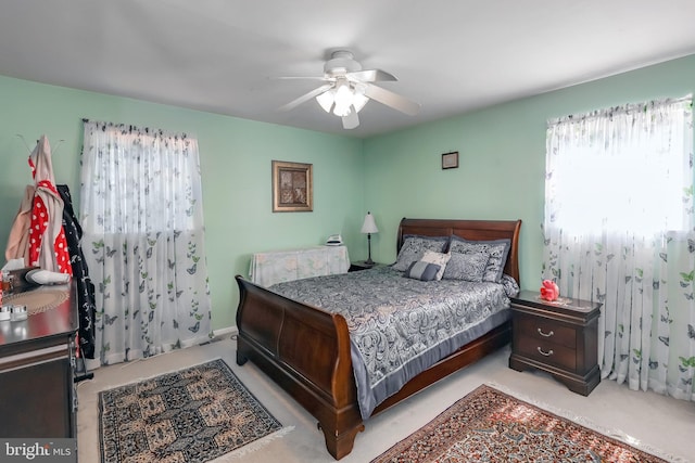 bedroom with carpet floors and a ceiling fan