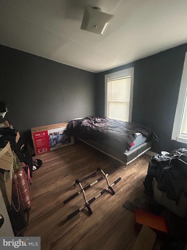 2859 W Lanvale St, Baltimore, MD 21216 - bedroom with wood finished floors and multiple windows
