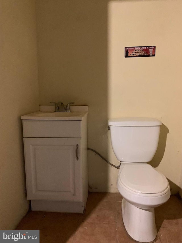 4808 Gransback St, Philadelphia, PA 19120 - half bathroom featuring tile patterned floors, toilet, and vanity
