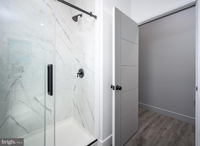 1308 E Bay Ave, Manahawkin, NJ 08050 - full bathroom with a marble finish shower and wood finished floors