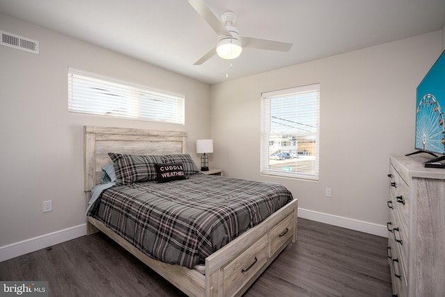 1308 E Bay Ave, Manahawkin, NJ 08050 - bedroom featuring dark wood-type flooring, multiple windows, and baseboards