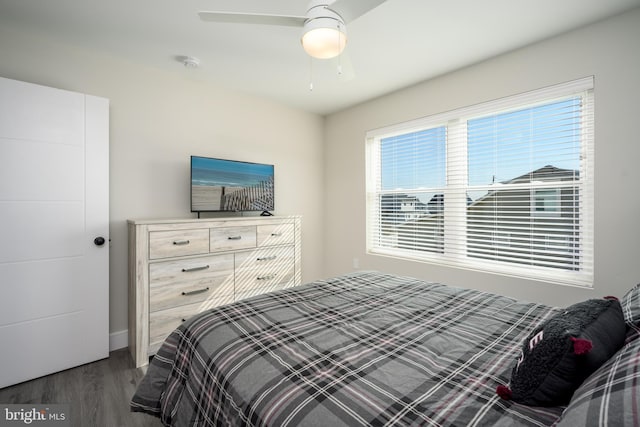 1308 E Bay Ave, Manahawkin, NJ 08050 - bedroom featuring wood finished floors, multiple windows, ceiling fan, and baseboards
