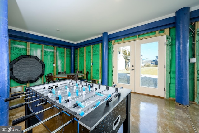 1308 E Bay Ave, Manahawkin, NJ 08050 - recreation room with french doors and concrete floors