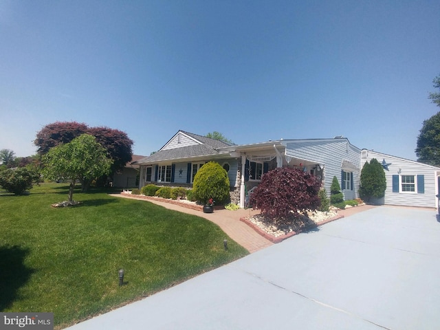 214 Alden Ave, Morrisville, PA 19067 - ranch-style house featuring concrete driveway and a front yard