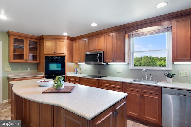 190 Chrismore Rd, White Post, VA 22663 - kitchen with black appliances, brown cabinetry, light countertops, and recessed lighting