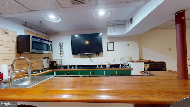 8609 N Dr, Clinton, MD 20735 - bar area featuring stainless steel microwave, a sink, and a drop ceiling