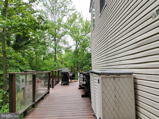 8609 N Dr, Clinton, MD 20735 - wooden terrace with view of wooded area