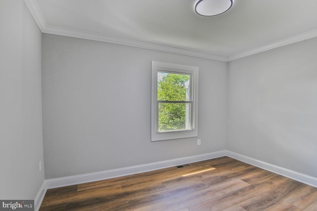 2218 Dairy Farm Rd, Gambrills, MD 21054 - unfurnished room featuring crown molding, baseboards, and dark wood-style floors
