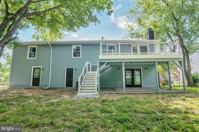 2218 Dairy Farm Rd, Gambrills, MD 21054 - back of house featuring stairs, a wooden deck, a chimney, french doors, and a yard
