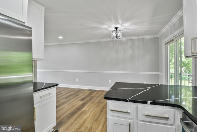 2218 Dairy Farm Rd, Gambrills, MD 21054 - kitchen featuring stainless steel refrigerator, dark countertops, white cabinets, crown molding, and recessed lighting