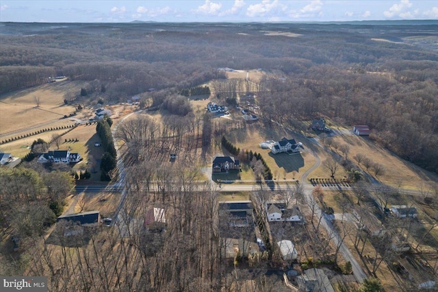 aerial view of property and surrounding area with rural landscape
