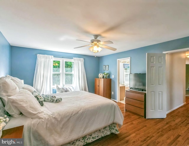 16068 Hayes Ln, Woodbridge, VA 22191 - bedroom with wood finished floors, baseboards, and ceiling fan