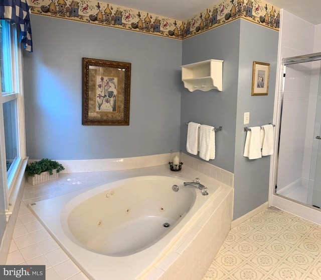 16068 Hayes Ln, Woodbridge, VA 22191 - full bathroom featuring a stall shower, a tub with jets, tile patterned floors, and baseboards