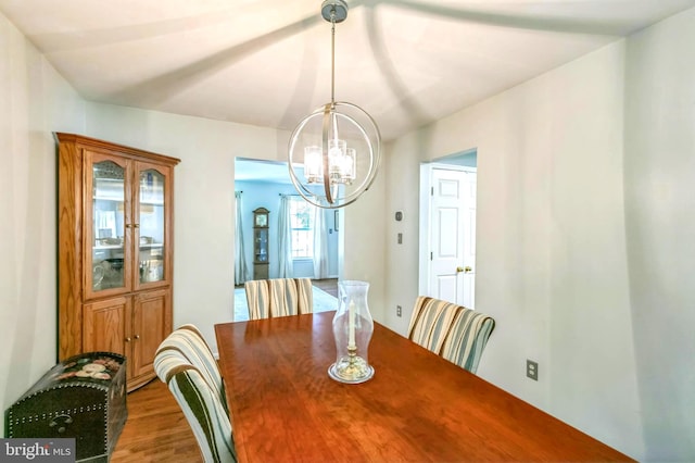 16068 Hayes Ln, Woodbridge, VA 22191 - dining space with a chandelier and wood finished floors