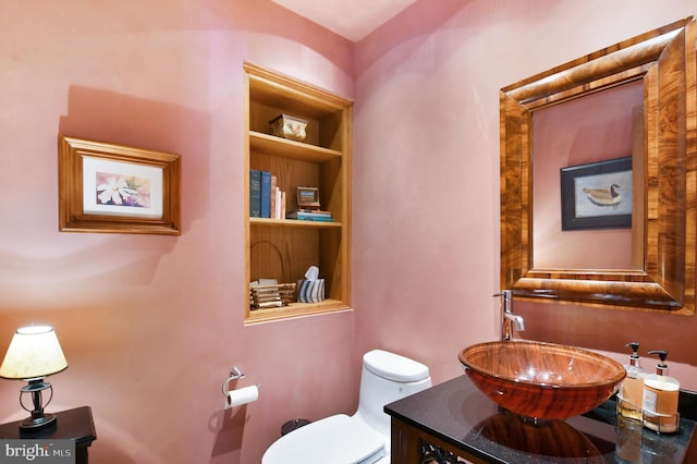 1402 Thurston Rd, Dickerson, MD 20842 - bathroom featuring built in features, toilet, and vanity