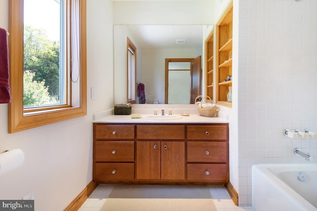 1402 Thurston Rd, Dickerson, MD 20842 - bathroom with vanity, a tub to relax in, and baseboards