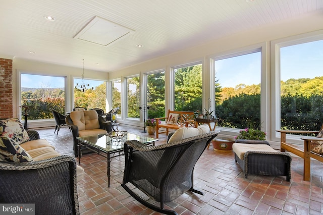 1402 Thurston Rd, Dickerson, MD 20842 - sunroom / solarium featuring french doors, brick floors, a chandelier, and recessed lighting