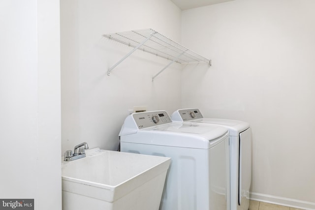 460 Preakness Run, Newark, DE 19702 - washroom with separate washer and dryer and light tile patterned floors