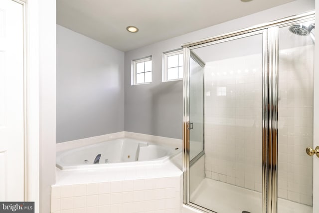 460 Preakness Run, Newark, DE 19702 - bathroom featuring a jetted tub, a shower stall, and recessed lighting