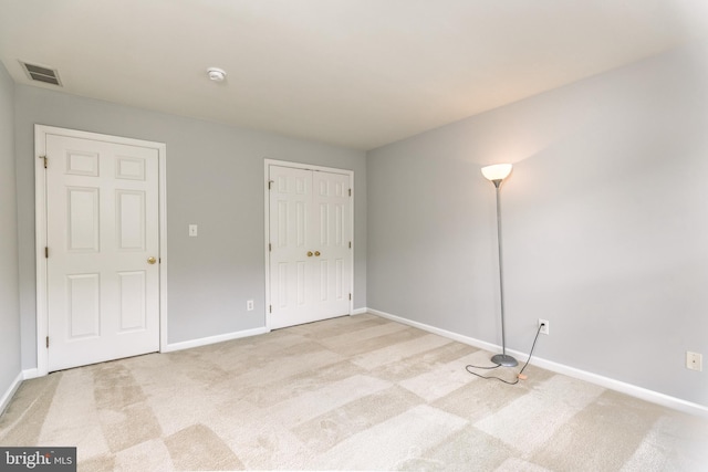 460 Preakness Run, Newark, DE 19702 - unfurnished bedroom with carpet floors, baseboards, and a closet