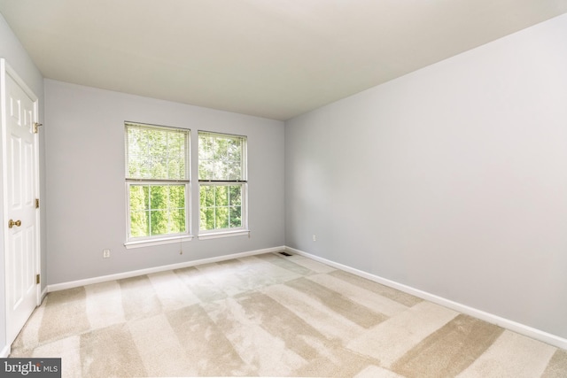 460 Preakness Run, Newark, DE 19702 - spare room with baseboards and light carpet