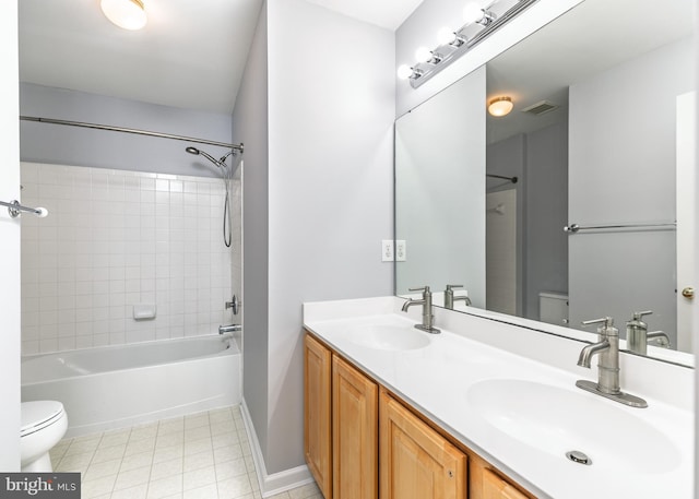 460 Preakness Run, Newark, DE 19702 - full bathroom featuring toilet, baseboards, double vanity, washtub / shower combination, and tile patterned flooring
