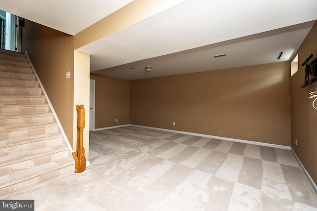 460 Preakness Run, Newark, DE 19702 - finished basement featuring light carpet, stairway, and baseboards