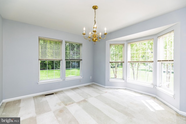460 Preakness Run, Newark, DE 19702 - carpeted empty room featuring a chandelier and baseboards