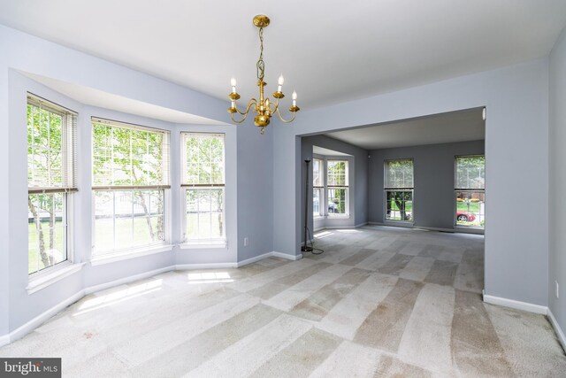 460 Preakness Run, Newark, DE 19702 - carpeted empty room with a chandelier and baseboards