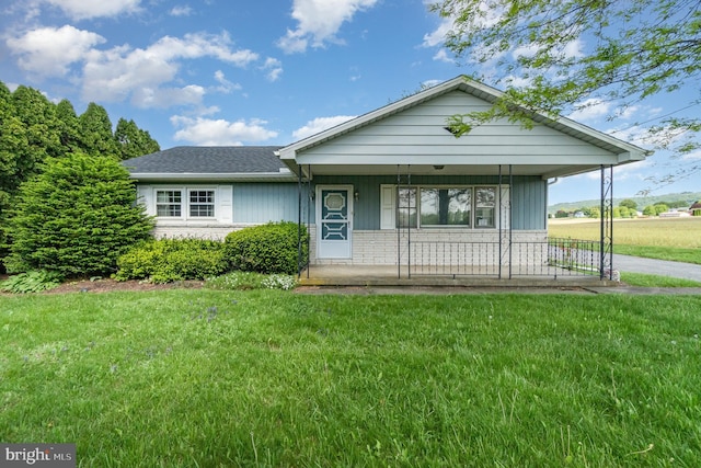 148 N Good Spring Rd, Hegins, PA 17938 - view of front of home featuring a porch and a front lawn