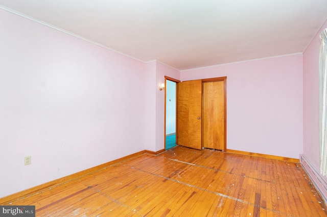 148 N Good Spring Rd, Hegins, PA 17938 - empty room featuring light wood-style flooring, ornamental molding, and baseboards