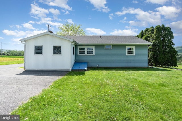 148 N Good Spring Rd, Hegins, PA 17938 - rear view of property featuring a lawn