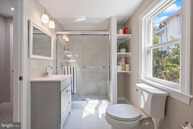 4914 22nd St N, Arlington, VA 22207 - bathroom with toilet, a stall shower, vanity, and baseboards