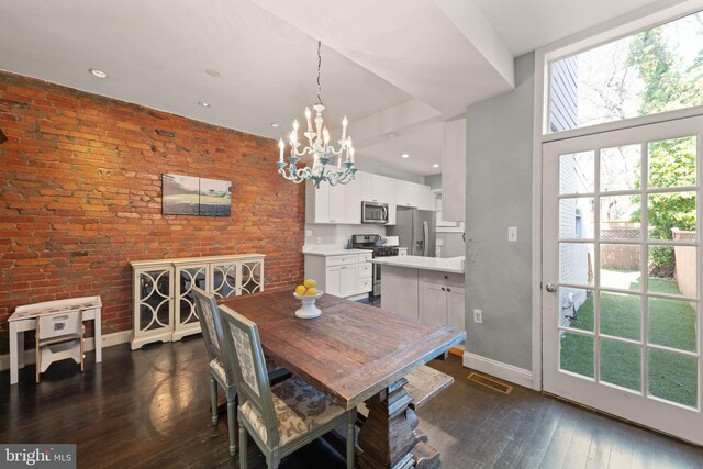 dining room with dark wood-style flooring, baseboards, a chandelier, and recessed lighting