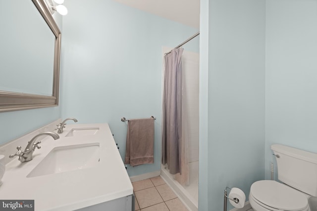 full bath featuring toilet, tile patterned floors, curtained shower, and double vanity