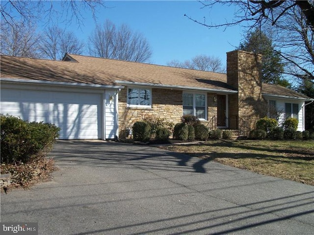 810 Hughes Dr, Hamilton, NJ 08690 - view of front of property featuring a chimney, driveway, a garage, stone siding, and a shingled roof