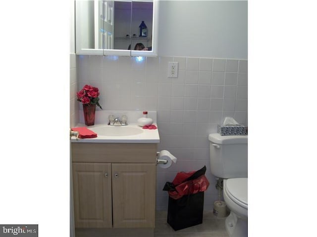 810 Hughes Dr, Hamilton, NJ 08690 - half bath with tile walls, toilet, and vanity