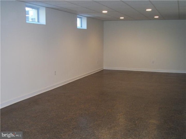 810 Hughes Dr, Hamilton, NJ 08690 - below grade area with healthy amount of natural light, recessed lighting, baseboards, and a paneled ceiling