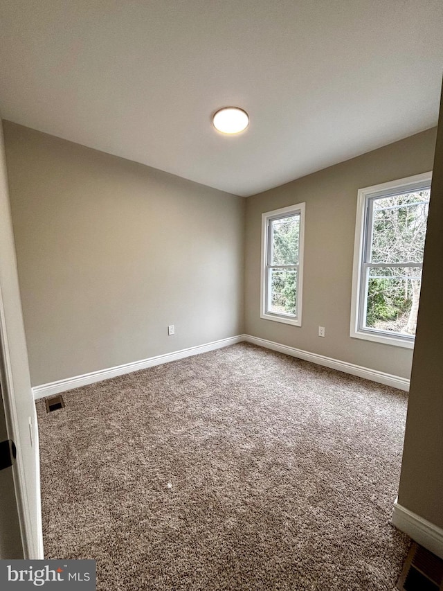 2217 N Pine St, Wilmington, DE 19802 - carpeted spare room with baseboards