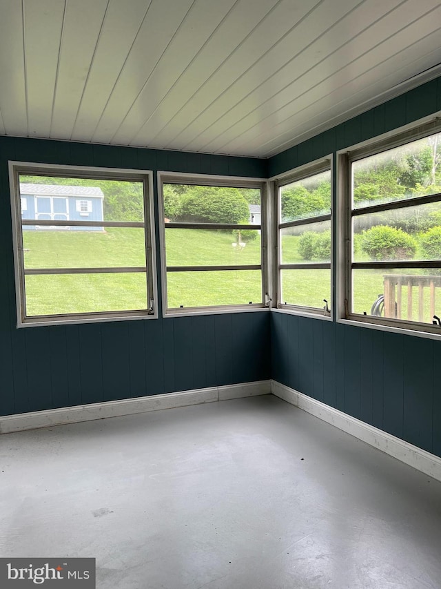 unfurnished sunroom featuring healthy amount of natural light