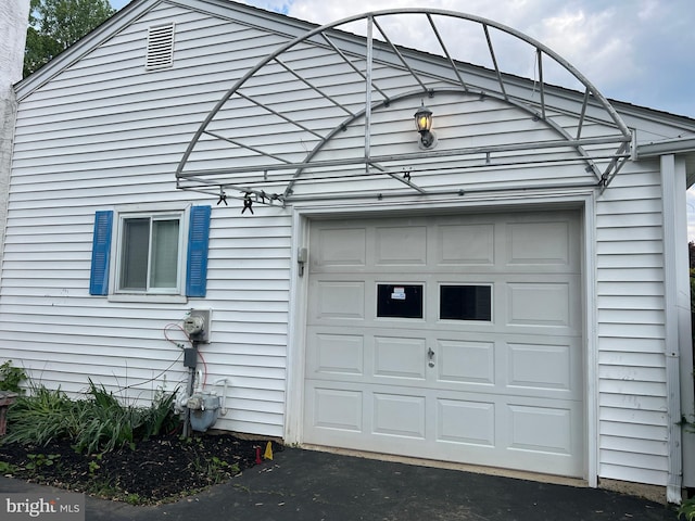 garage with driveway