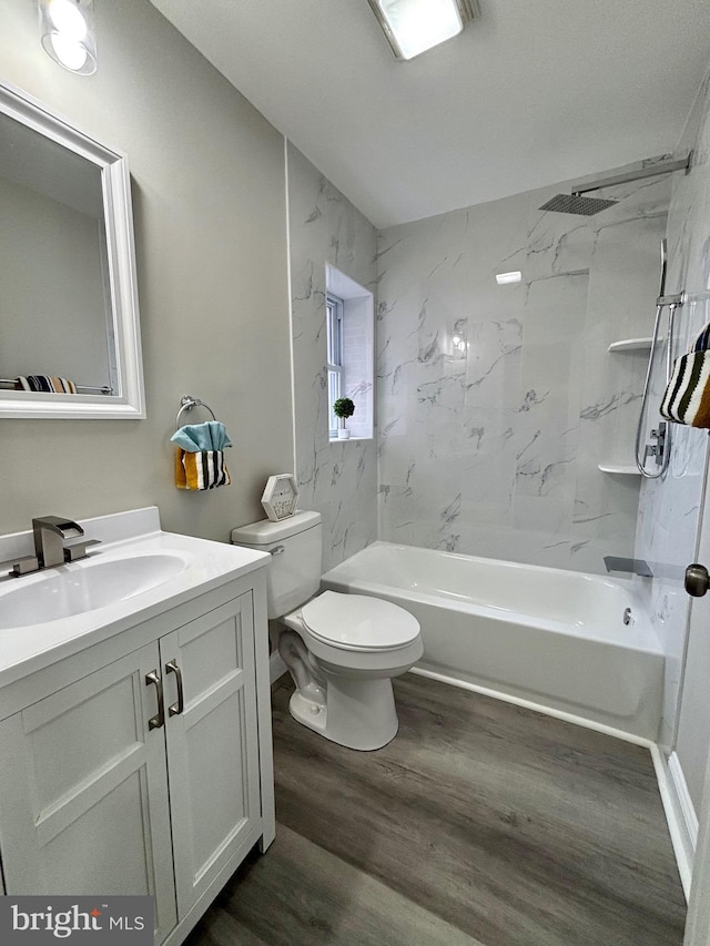 1304 N Claymont St, Wilmington, DE 19802 - full bath with wood finished floors, vanity, shower / bath combination, and toilet