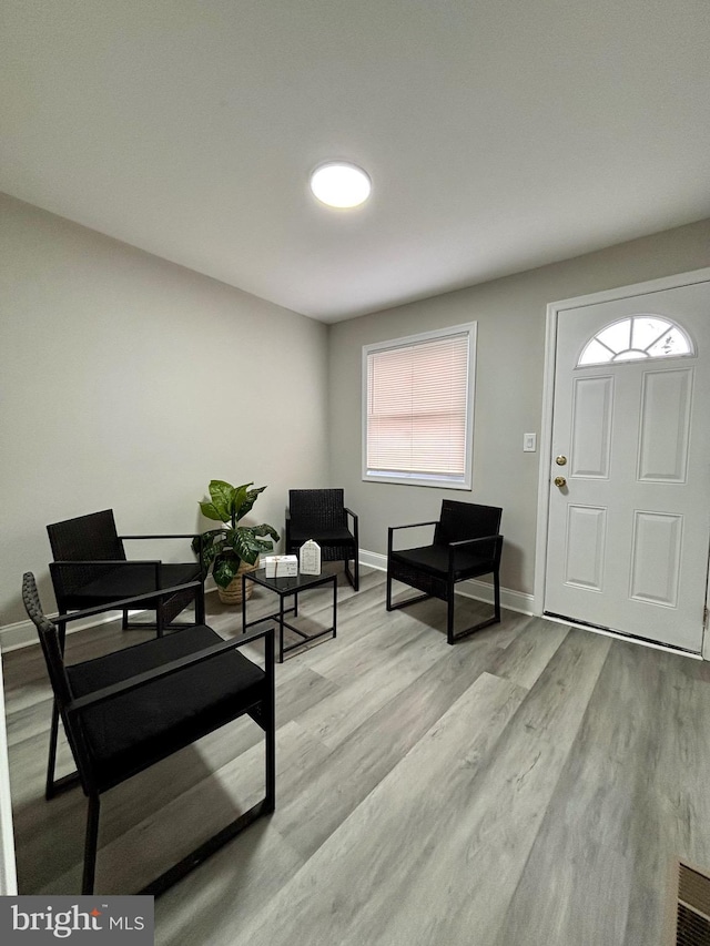 1304 N Claymont St, Wilmington, DE 19802 - entrance foyer with light wood-style flooring and baseboards